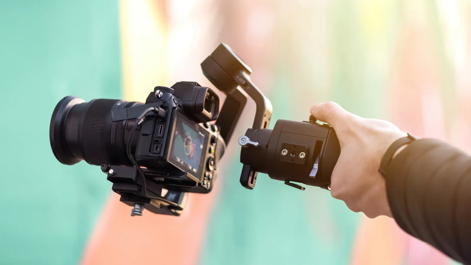 A camera operator filming with a gimbal