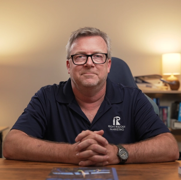 Portrait of Dan Gill, Videography Specialist at Right Rudder Marketing