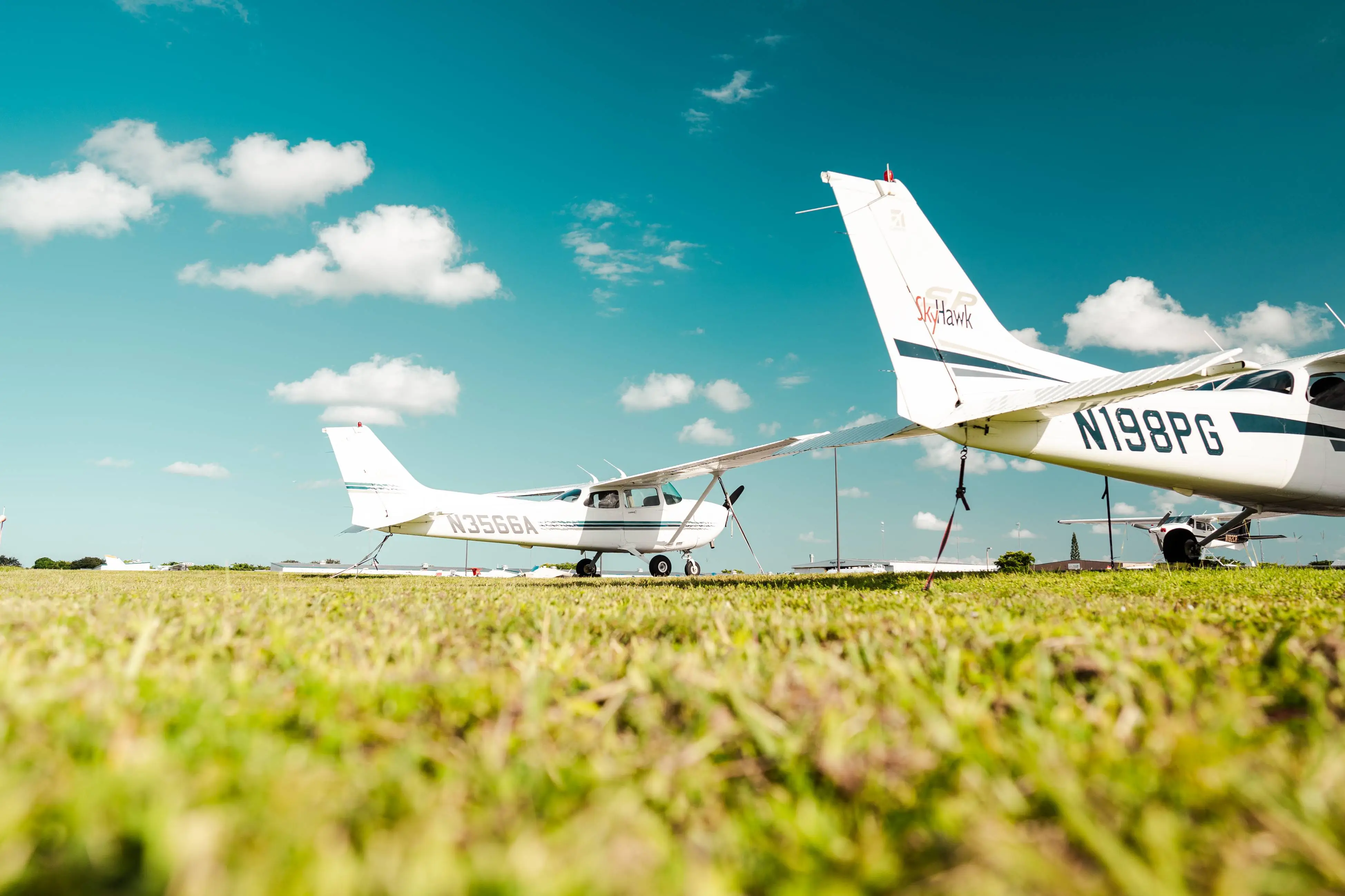 Two cessna planes on the runway